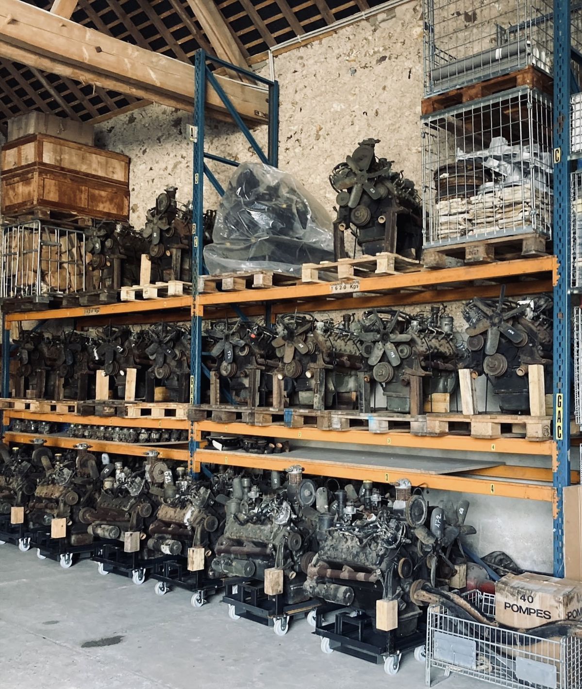 Racked used engines in a parts warehouse